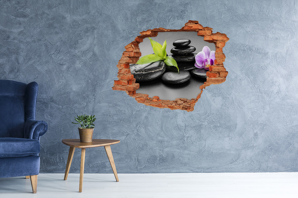 Vinyl muursticker 3D breekeffect Een rustgevend uitzicht met stenen en planten.