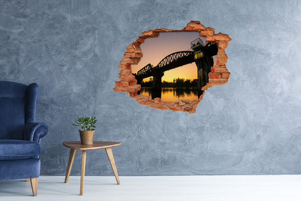 Vinyl muursticker 3D breekeffect Zonsondergang boven de rivier