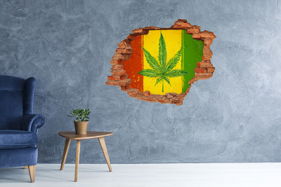 Vinyl muursticker 3D breekeffect Groen cannabisblad op een geel-rood-groene achtergrond
