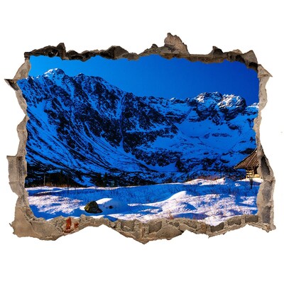 Zelfklevende muursticker 3D gat Winterhuisje in de bergen