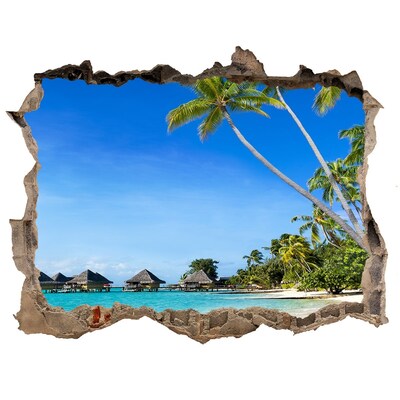 Wandsticker 3D doorkijk Caribisch strand door een gat in de muur