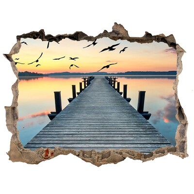 Wandsticker 3D gat met uitzicht Zonsondergang boven het meer