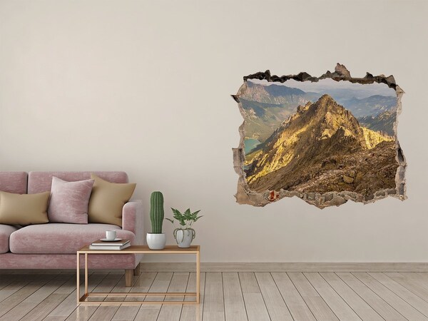 Zelfklevende 3D wandsticker illusie Berglandschap door een gat in de muur