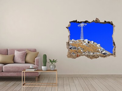 Zelfklevende 3D wandsticker illusie Berglandschap door een gat in de muur