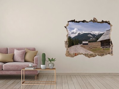 Wandsticker 3D gat met uitzicht Berglandschap met hutten