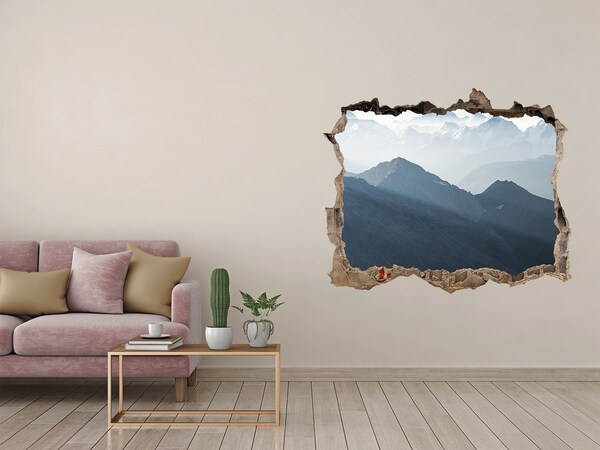 Zelfklevende 3D wandsticker illusie Berglandschap door een gat in de muur