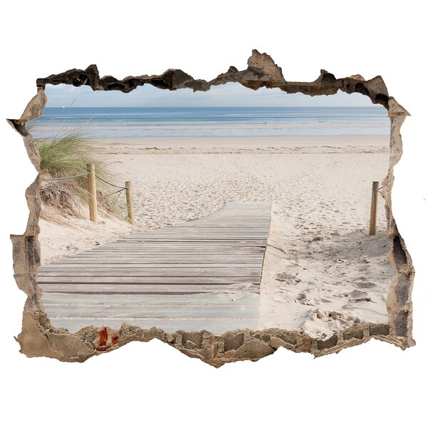 Wandsticker 3D gat met uitzicht Een mysterieus strand met een houten pier.