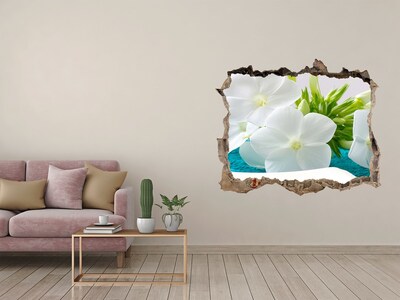 Wandsticker 3D gat met uitzicht Een bloemenparadijs achter de muur.