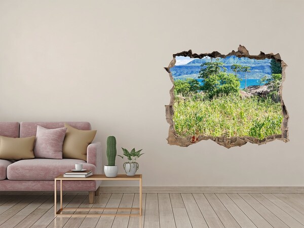 Zelfklevende 3D wandsticker illusie Tropisch landschap achter het gat in de muur