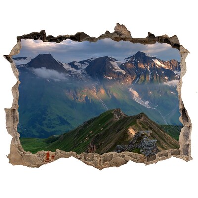 Wandsticker 3D gat met uitzicht Berglandschap achter het gat in de muur
