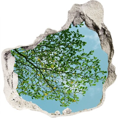Zelfklevende muursticker 3D gat Groene bladeren onder een blauwe hemel
