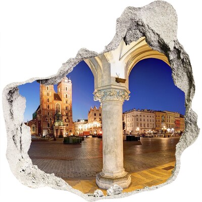 3D muursticker effect gat in de muur Het centrale marktplein van Krakau 's nachts