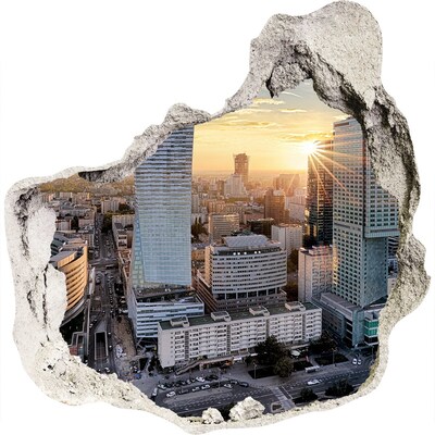 3D wandsticker gat in de muur Uitzicht op de stad bij zonsondergang
