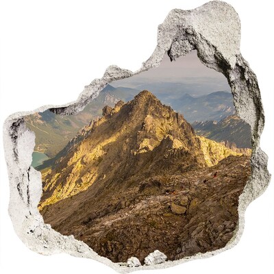 3D wandsticker gat in de muur Berglandschap door een gat in de muur