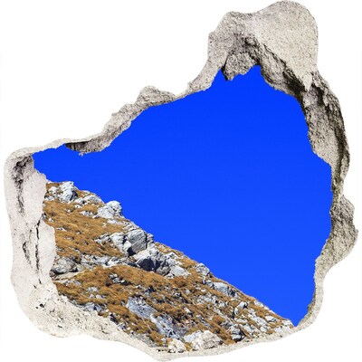 3D wandsticker gat in de muur Berglandschap door een gat in de muur