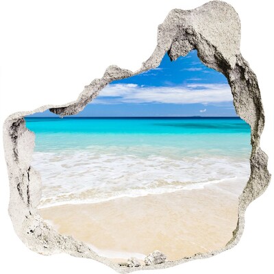 3D muursticker effect gat in de muur Caribisch strand door een gat in de muur