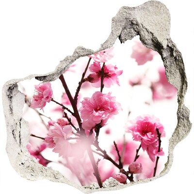 3D muursticker effect gat in de muur Een bloemenparadijs achter de muur.