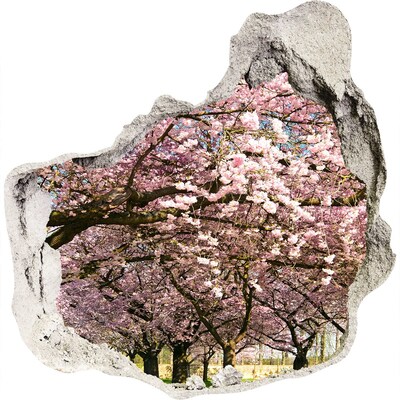 Zelfklevende muursticker 3D gat Bloeiende kersenbomen in het voorjaarspark.
