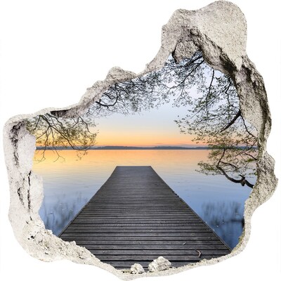 3D wandsticker gat in de muur Zonsondergang boven het meer
