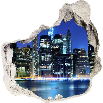 3D muursticker effect gat in de muur De skyline van New York 's nachts