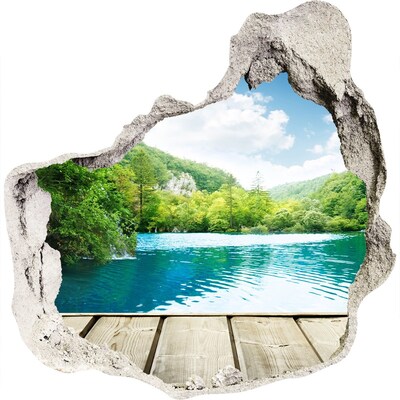 3D wandsticker gat in de muur Een baai te midden van de bergen