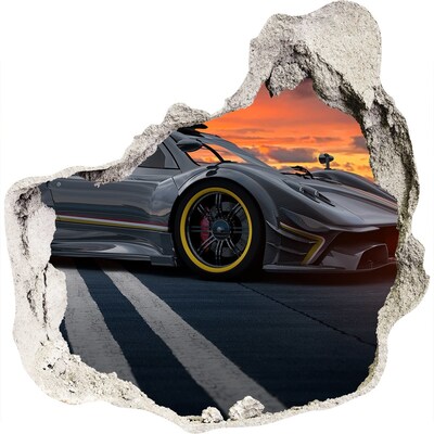 3D muursticker effect gat in de muur Een raceauto op het circuit.