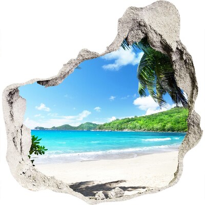 Zelfklevende muursticker 3D gat Caribisch strand door een gat in de muur