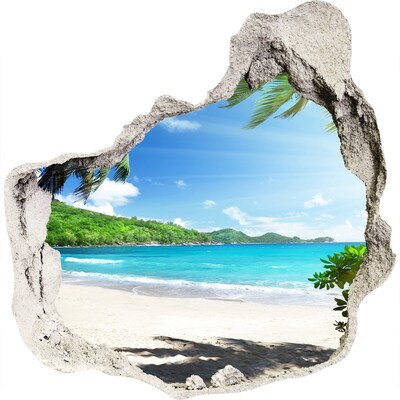 Zelfklevende muursticker 3D gat Caribisch strand door een gat in de muur