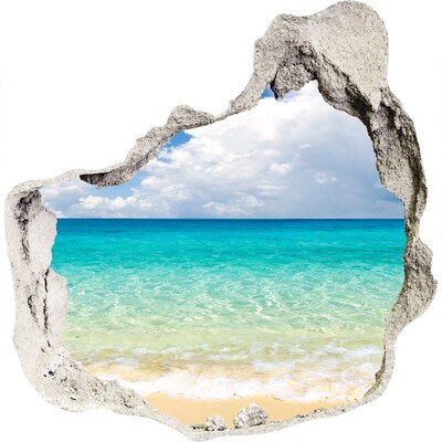 3D muursticker effect gat in de muur Caribisch strand door een gat in de muur