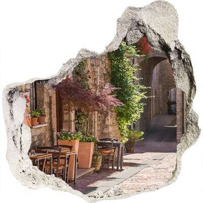 3D muursticker effect gat in de muur Een charmante straat in de stad