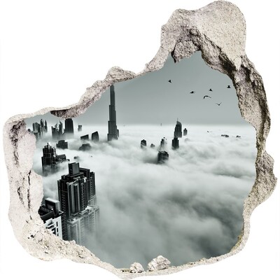 3D wandsticker gat in de muur Stad in de wolken
