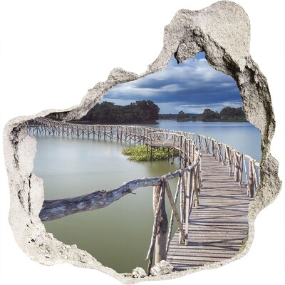 3D muursticker effect gat in de muur Een brug op het water