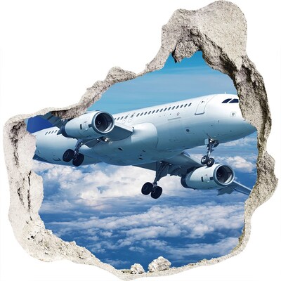 3D muursticker effect gat in de muur Aankomst van een vliegtuig in de wolken
