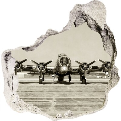 Zelfklevende muursticker 3D gat Een oud vliegtuig op het vliegveldplatform.