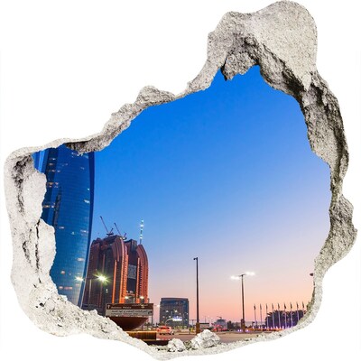 3D wandsticker gat in de muur Moderne stad bij zonsondergang
