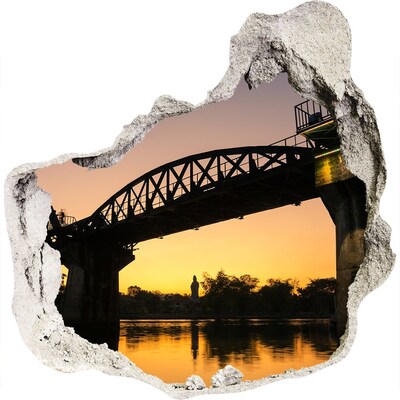 3D muursticker effect gat in de muur Zonsondergang boven de rivier