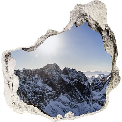 3D muursticker effect gat in de muur Berglandschap met zonnestralen
