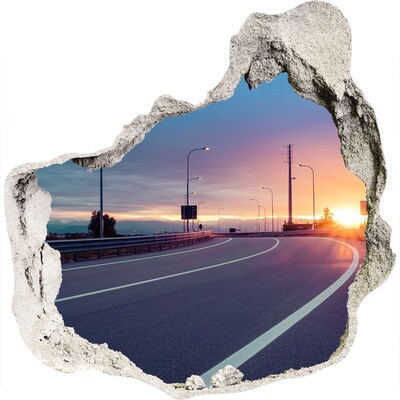 3D muursticker effect gat in de muur Zonsondergang boven de weg