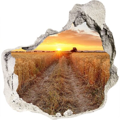 Zelfklevende muursticker 3D gat Gouden zonsondergang boven een graanveld