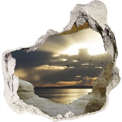 3D wandsticker gat in de muur Zonsondergang boven de zee
