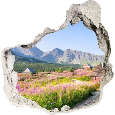 Zelfklevende muursticker 3D gat Een open plek in de bergen vol bloemen