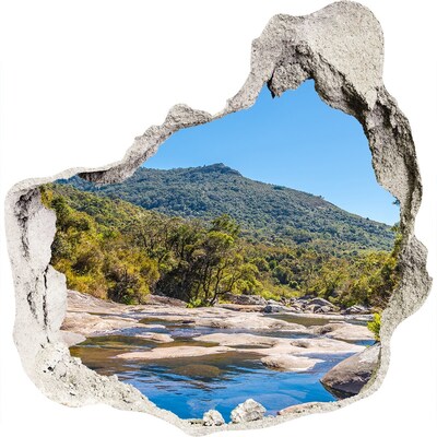 3D muursticker effect gat in de muur Berglandschap achter het gat in de muur