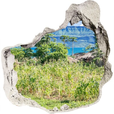 3D wandsticker gat in de muur Tropisch landschap achter het gat in de muur