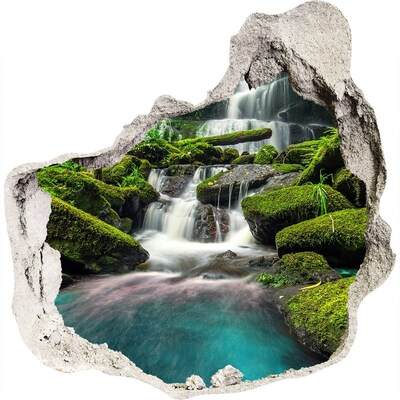 3D muursticker effect gat in de muur Een waterval te midden van het groen.