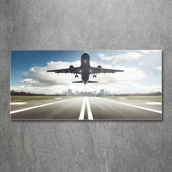 Schilderij op acrylglas Een vliegtuig dat opstijgt