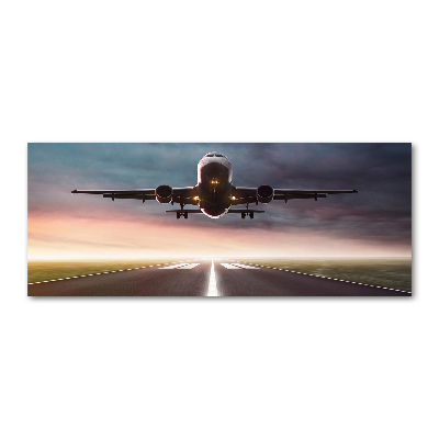 Schilderij op acrylglas Een vliegtuig dat opstijgt