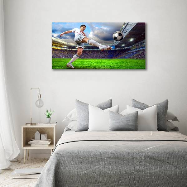 Foto canvas Een voetballer in het stadion.