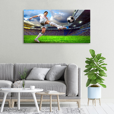 Foto canvas Een voetballer in het stadion.