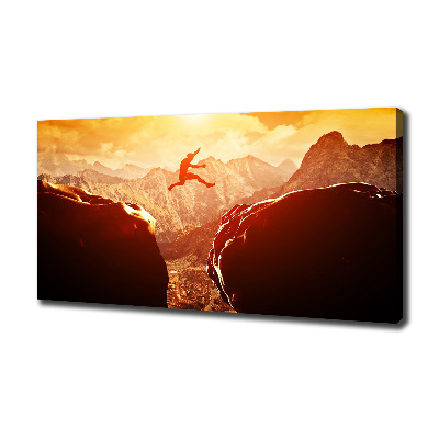 Canvas foto Spring over de afgrond