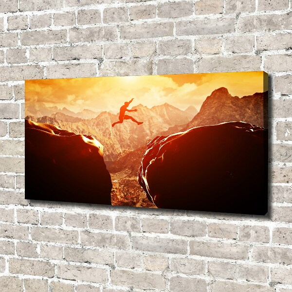 Canvas foto Spring over de afgrond